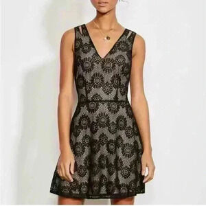 Ali & Jay women’s black lace sleeveless mini A-Line dress with nude underlay